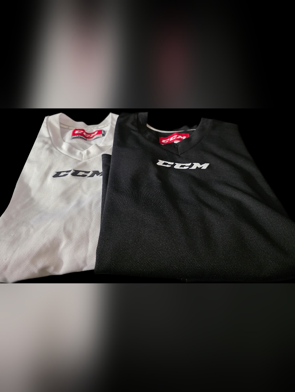CCM Youth XL Black and White GOALIE CUT Hockey Jerseys
